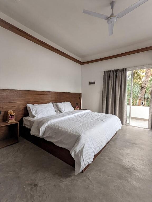Dhoadhi Retreat bedroom in Thulusdhoo, Maldives
